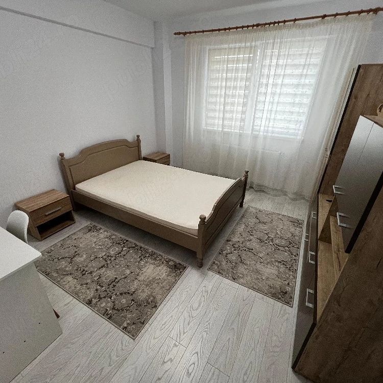 Inchiriez apartament nou,modern cu 2 camere complet mobilat si utilat - Photo 1