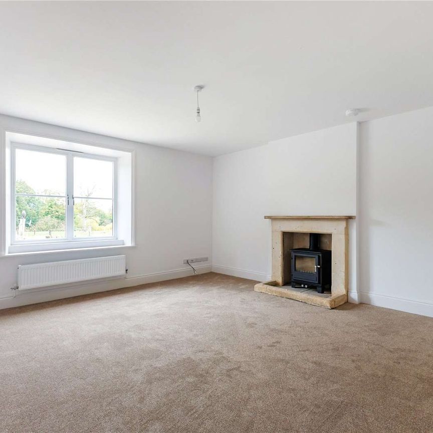 A beautifully renovated five bedroom detached farmhouse, situated just outside Winchcombe, offering generous living space and a large garden with hillside views. - Photo 1
