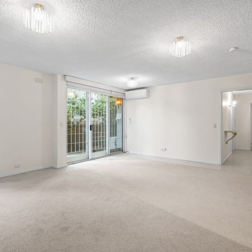 Superbly Located Two Bedroom Apartment With Parking For One Car! - Photo 1