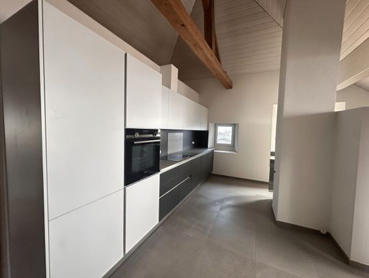 Beautiful attic apartment with character - Photo 1