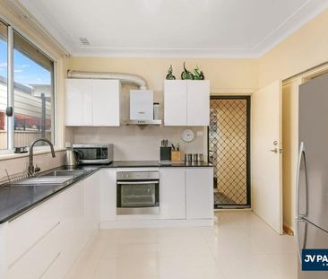 Comfort Family Home with Self-Contained Granny Flat in Prime Location - Photo 2