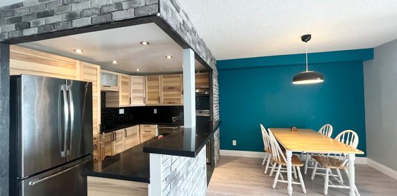 Two rooms in **Newly-renovated** apartment on high floor in - Photo 2