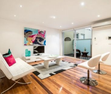 Industrial-Style Warehouse Living with Private Rooftop Terrace - Photo 2