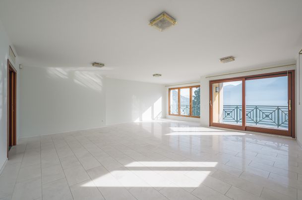 AMPIO APPARTAMENTO IN PRIMA FILA LAGO - Photo 1