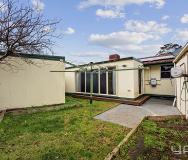 Spacious Family Home with Bonus Granny Flat in a Prime Location! - Photo 1