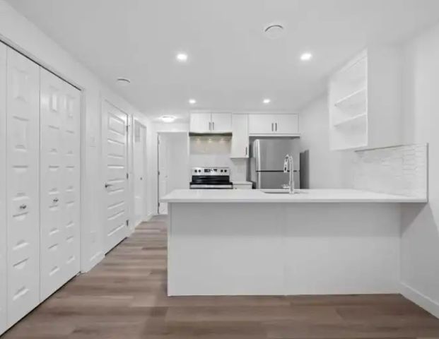 Bright Brand New Luxury Basement Suite | Calgary - Photo 1