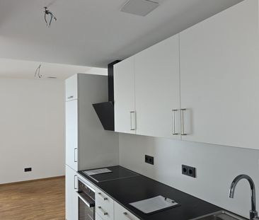 Gemütliche Singlewohnung mit Balkon und Einbauküche wartet auf Sie! - Photo 6