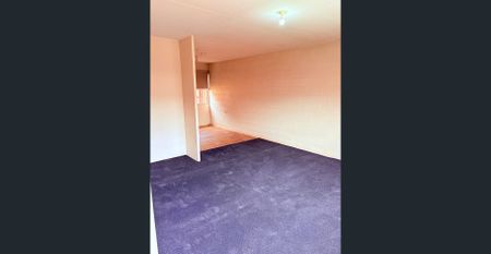 Two-storey, two-bedroom unit - Photo 2