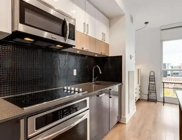 Calgary's Hippest East Village- 1 Bed with Bow River Views | 619 Confluence Way SE, Calgary - Photo 1