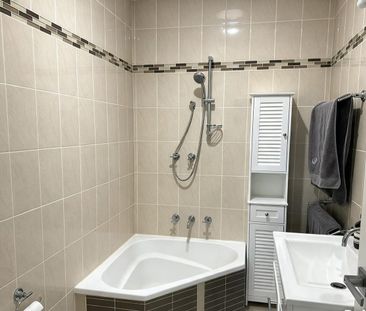 Renovated 3-Bedroom House with Spacious Living & Outdoor Entertaining - Photo 6
