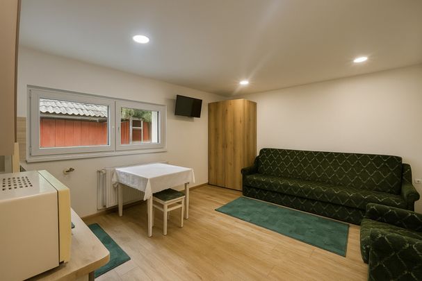 Garsoniera la casa în zona Piața Cluj - Fotografie 1