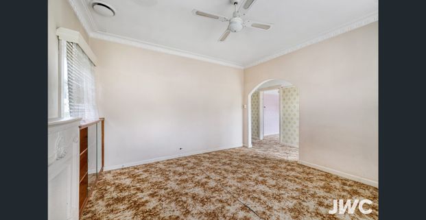 Charming Home with Spacious Layout & Established Gardens - Photo 1