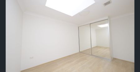 Fully Renovated 2-Bedroom 1.5 bathroom Unit in the Heart of Burwood - Photo 3