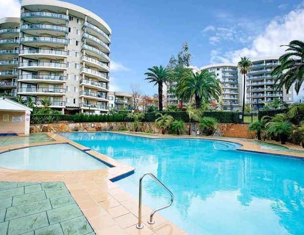 Resort Lifestyle Modern 2-Bedroom Unit in Prime Location - Photo 1