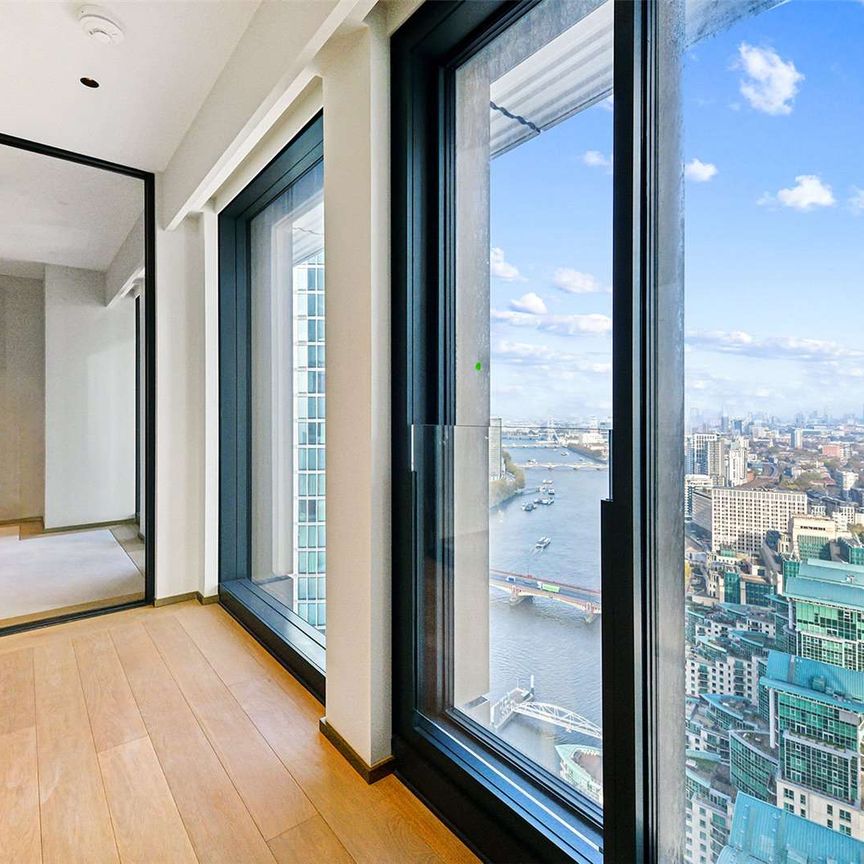 A modern three bedroom apartment with river views - Photo 1