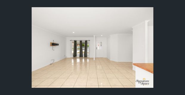 Welcome to 3 Tiree Court, Eagleby—a spacious, family-friendly 4-bedroom home situated on a massive 700sqm block in a quiet cul-de-sac location. - Photo 1