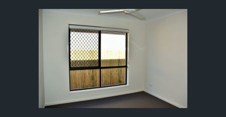 Modern 4-Bedroom Family Home in Highly Sought-After Joyner - Photo 3