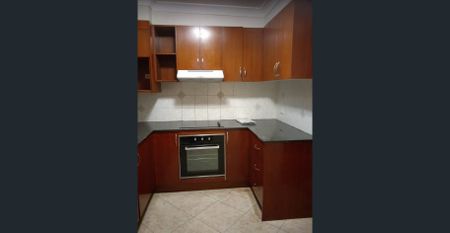 Top Floor Unit with 3 bedrooms - AVAILABLE NOW - Photo 5