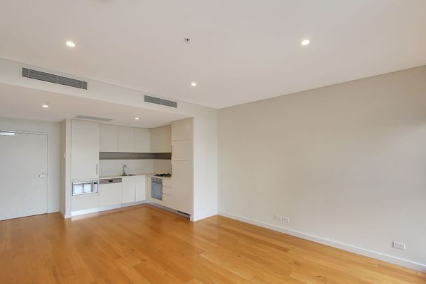 North Facing Bedroom with New Appliances and Floorboards! - Photo 1