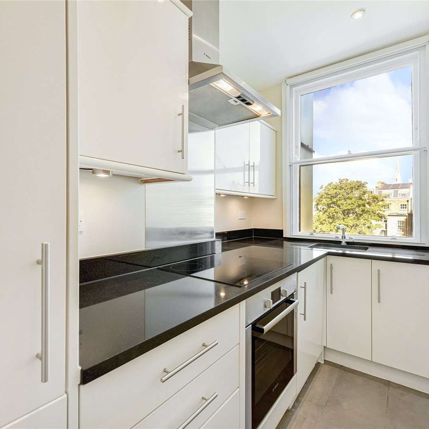 This one bedroom apartment offers contemporary living and is conveniently located close to the transport links and amenities of Victoria. - Photo 1
