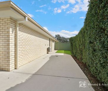 COMFORTABLE TWO-BEDROOM HOME WITH SECURE PRIVATE YARD - Photo 5