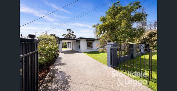 Relaxed Coastal Living Minutes From The Water - Photo 1