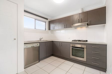 Stylish & Convenient 1-Bedroom Townhouse - Photo 2