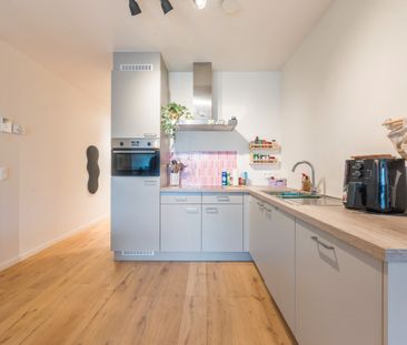 Nieuwbouwappartement met zonnig terras in hartje Steendorp - Photo 2