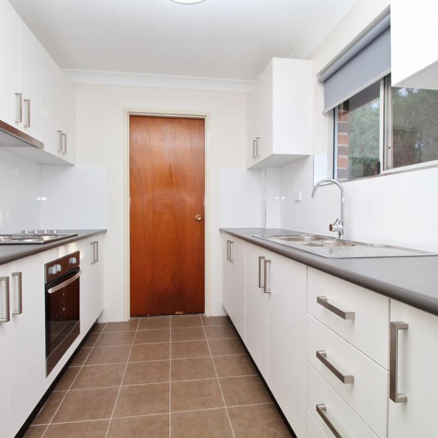 VALUE PACKED TWO-BEDROOM APARTMENT! - Photo 1