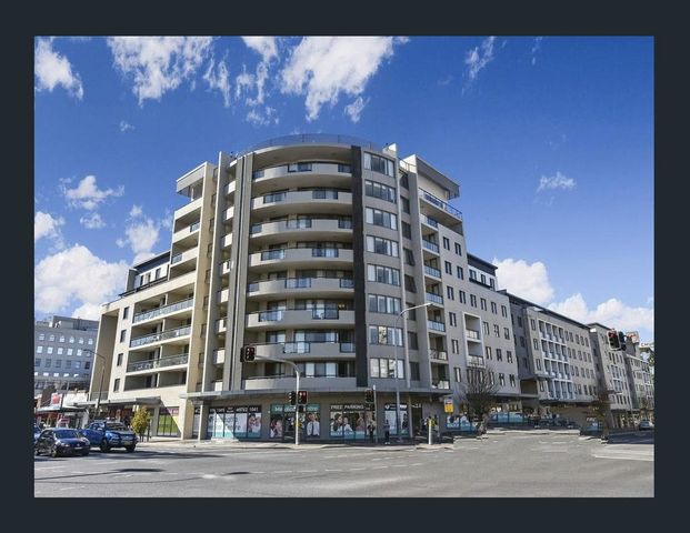 STYLISH AND PERFECTLY LOCATED - Photo 1