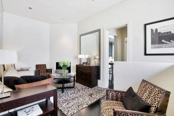 Fully Furnished Three-Bedroom Designer Home - Photo 1