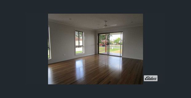 Stylish Four-Bedroom Home with Contemporary Features - Photo 1