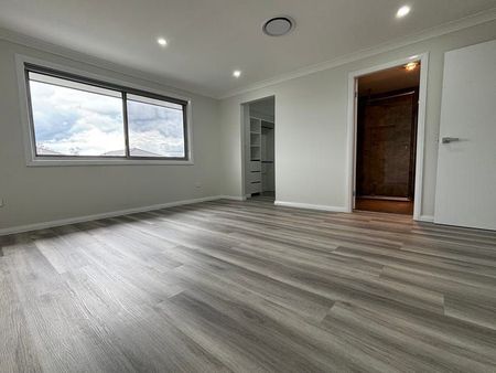 Brand New 5 Bedroom Family Home - Photo 5