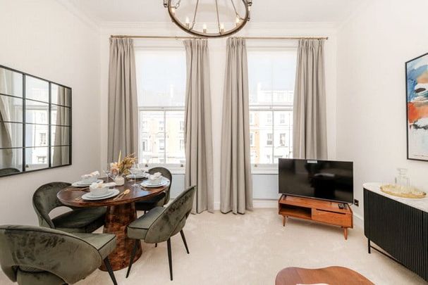 A smart two bedroom, two bathroom flat of just over 760 sq. ft situated on the second floor (with lift), located on the west side of Lexham Gardens that is separated by Marloes Road. Tenancy Length: Minimum 12 months EPC Rating C | Council Tax Band F - Photo 1