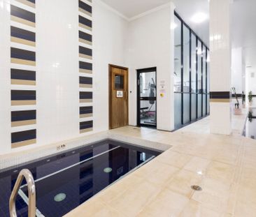 One Bedroom Apartment Flooded with Natural Light - Photo 1