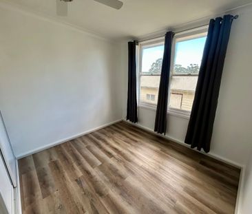 FRESHLY UPDATED HOME IN A FAMILY-FRIENDLY LOCATION - Photo 4