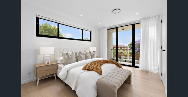 Bespoke Duplex Showcasing Refined Coastal Craftsmanship - Photo 1