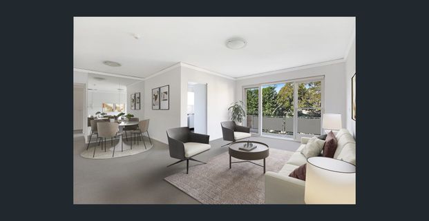 Spacious 3 Bedroom Unit with LockUp Garage - Photo 1