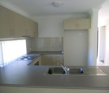 Your Next Family Home Awaits in North Mackay! - Photo 6
