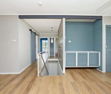 Spacious Dual-Level Home with Pool & Shed in Prime Location - Photo 1