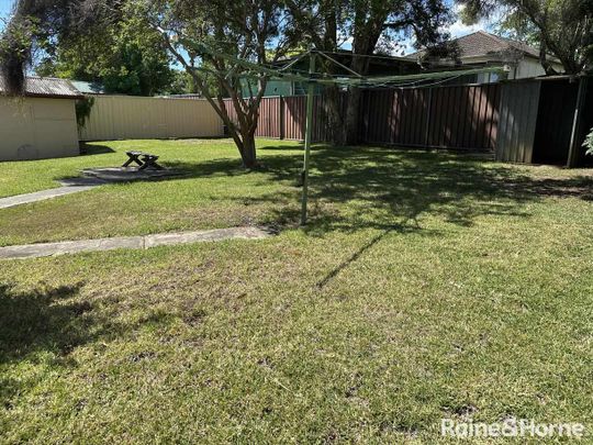 Two Bedroom Home With Spacious Backyard - Photo 1