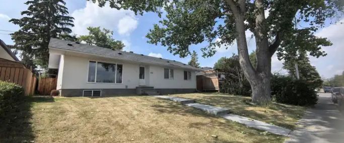 New Renovated 3 Bedrooms Mainfloor Suite Next to Schools | 131 Grafton Drive Southwest, Calgary - Photo 1