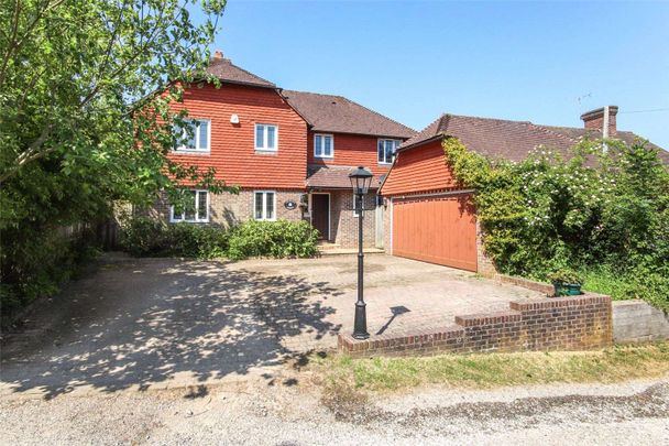 An attractive, modern, detached family house situated on the edge of the popular village of Wadhurst, well placed for local amenities, schools, travel links and nearby towns - Photo 1