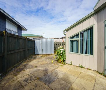 Tucked-Away Comfort: Three Bedroom Home - Photo 6