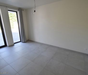 Energiezuinig recent gelijkvloers 2-slpk. appt met terr., tuin en a... - Photo 6