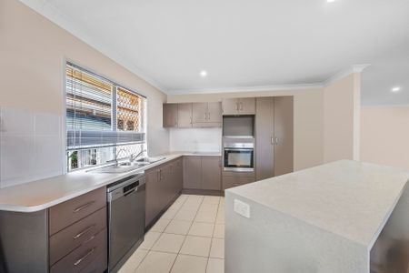 Spacious Family Home in Prime Bushland Beach Location - Photo 3
