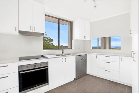 Newly Renovated Apartment with District & Water Views - Photo 4
