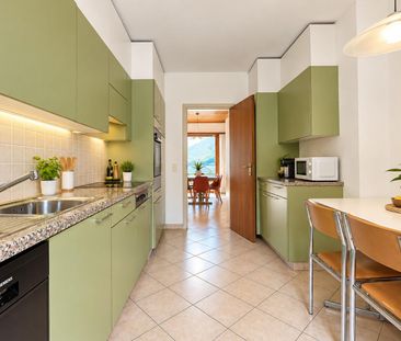 AFFITTASI 5.5 LOCALI CON GIARDINO E VISTA LAGO A MELANO - Foto 6