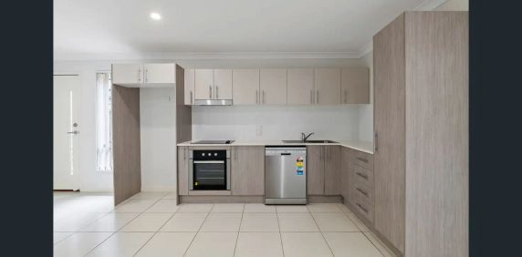 “Modern 1-Bedroom Unit with Garage & Outdoor Patio” - Photo 2