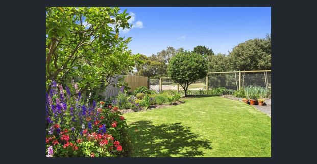 Coastal Comfort in a Quiet Court Location - Photo 1